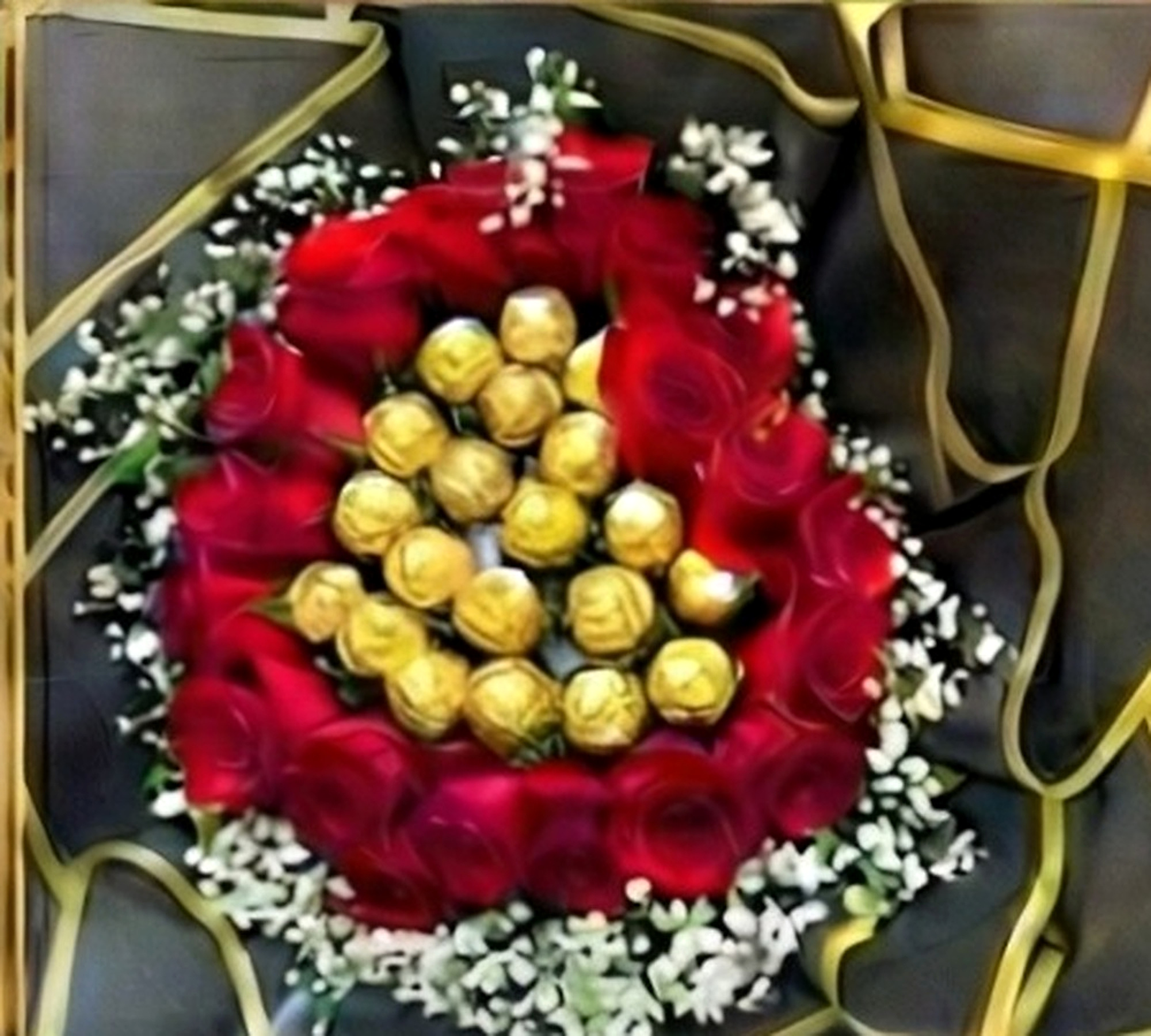 A red rose and gold custom gift arrangement by Zee Star Creations.